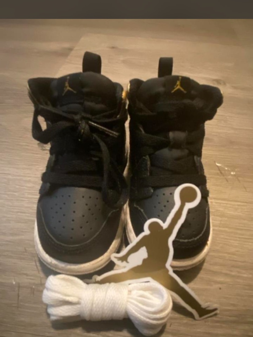 Jordan Kids Black and Gold High-Top Sneakers with White Laces